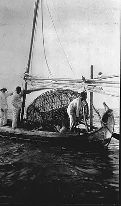 Mayang with a large fishing trap in the Thousand islands, bay of Batavia.