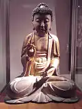 Seated Buddha, 11th-12th century. Gilded wood, h. 62 cm. Musée Guimet.