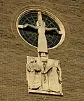 The Calvary which forms the east window by the British sculptor Eric Gill.