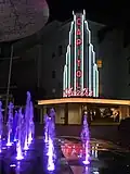 Capitol Theatre at night, with light-up fountain