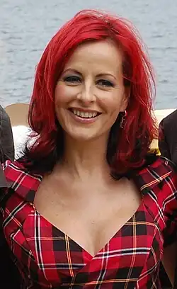 Upper body photograph of Carrie Grant.