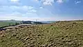 On the eastern slope looking southwest, showing a section of the ramparts