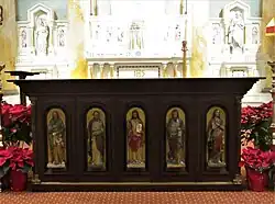 Figures of Jesus and the saints on the altar were once a part of the pulpit