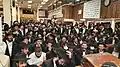 Chabad Hasidim in the main synagogue at 770