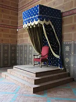 Baldachin in blue decorated with fleurs-de-lys in the former royal residence of Château de Blois