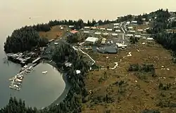 Aerial of Chenega Bay Village and boat harbor - Chenega Bay, Evans Island, 1989