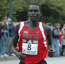 Robert Kipkoech Cheruiyot in the 2006 Boston Marathon with number on front of bib