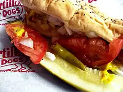 Chicago-style hot dog with sport peppers