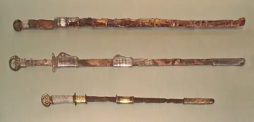 Two Chinese swords (top) of the Sui dynasty. Bottom: Japanese sword with scabbard, Kofun period, 6th century, Met Museum.