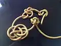 Celtic button knot single, with 4 steps of tying it