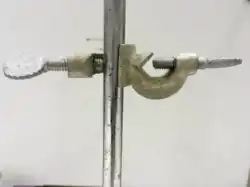 Clamp holder attached to ring stand
