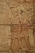 Taharqa (left) embracing Horus (Re-Horakhty) on the Kawa shrine[65]