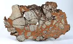 Native copper cementing host rock, Ray Mine, Arizona (11.5 x 7.4 x 0.7 cm)
