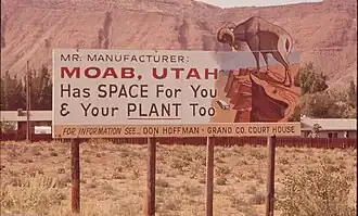 County-sponsored sign promoting manufacturing in Moab during the early 1970s