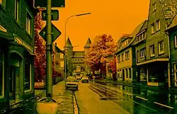 Lüdinghauser Tor in Dülmen (1981); remapped false color represents infrared wavelengths (as reflected by foliage) as shades of red