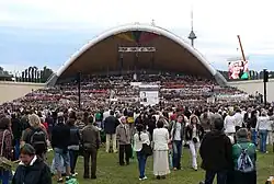 An outdoor stage and a crowd