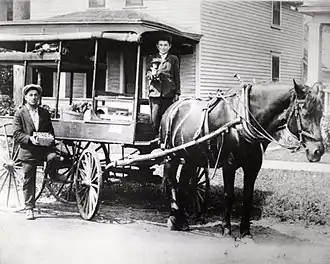 David and Harry Silverman in their fruit-peddling cart, Saint Paul, Minnesota, c. 1920