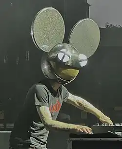 DJ with a mouse head mask performing live