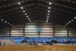 Large Delaware flag hanging inside Quillen Arena.