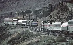 Two trains meet in a valley