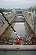 Dewatered main lock undergoing repairs at McAlpine Locks, 1987