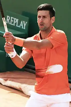 Novak Djokovic with a tennis racket