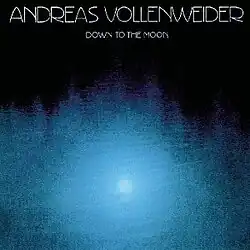 Photograph of reflected moon on the dark blue surface of water. Upper rim inscription, thin white letters reads : Andreas Vollenweider, Down to the Moon
