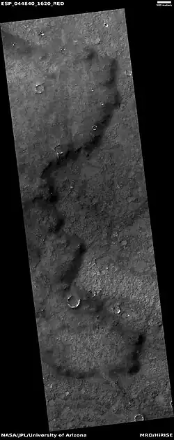 Edge of lava flow, as seen by HiRISE under HiWish program Location is Solis Planum in Phoenicis Lacus quadrangle.