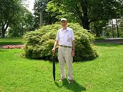 Ed Richardson with Japanese Threadleaf Maple, June 2013 This tree was planted in honor of Mr. Richardson's work measuring and mapping the trees of Cedar Hill Cemetery.