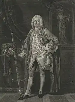 A full-length monochrome portrait of an elderly man, wearing 18th-century dress, and a long wig