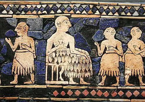 Enthroned Sumerian king of Ur, with attendants. Standard of Ur, c. 2600 BCE.