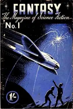 Two people watch a futuristic plane at night