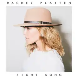 The side profile of a young woman with blonde hair, a tan hat, and a white top. A white border surrounds the image, with the name, Rachel Platten, and title, "Fight Song", standing above and below the image, respectively, in black typeface.