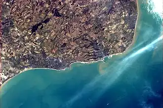 Folkestone and Dover from the International Space Station, showing the White Cliffs and the tracks of ferries