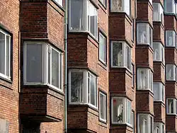 The multi-storey bays and windows are typical of the Nordic funkis style