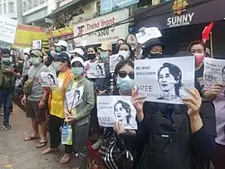 Image 39Protesters in Yangon carrying signs reading "Free Daw Aung San Suu Kyi" on 8 February 2021 (from History of Myanmar)