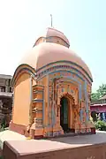Gourhati: Gangadhar Shiva temple (in picture), built in 1752, with terracotta decoration, and other temples.