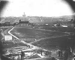 View of Nashville, ca. 1880. The church and Buddeke-Byrne house are in the foreground; the capitol is in the background.