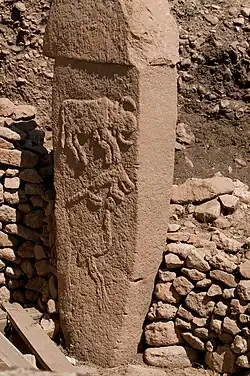 One of the pillars of Göbekli Tepe bearing animal representations in bas-relief, c. 10th millennium BC.