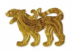 Gold plate in the form of walking feline found in Majiayuan M3, Gansu.[2]