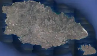 The map of the Maltese archipelago, with a red dot towards the northern coast of the island of Gozo showing the location of Qbajjar Bay.