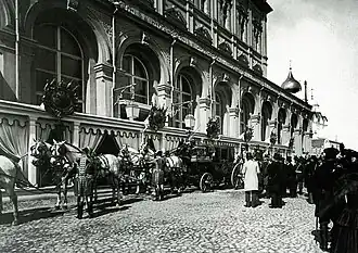 The royal coach of Nicholas II by the palace, 1896