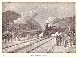Drawing of a steam engine and train approaching station with an honor guard at attention