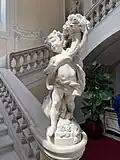 One of the two putti (left) in the main staircase of the Palace