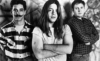 Hüsker Dü in 1986. Left to right: Greg Norton, Grant Hart, and Bob Mould.