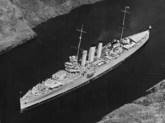 Image 85An aerial view of the second HMAS Australia – a heavy cruiser – passing through the Panama Canal in March 1935. Australia saw extensive combat in World War II. (from History of the Royal Australian Navy)