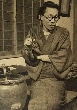 A two-thirds picture of Fumio Hayasaka wearing a kimono.