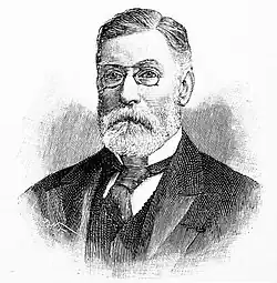 bearded man in Victorian clothes