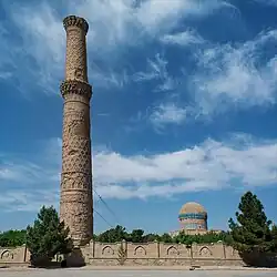 Remaining minaret of the madrasa and mausoleum