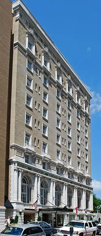 Exterior of multi-story hotel building with Beaux-Arts architectural details